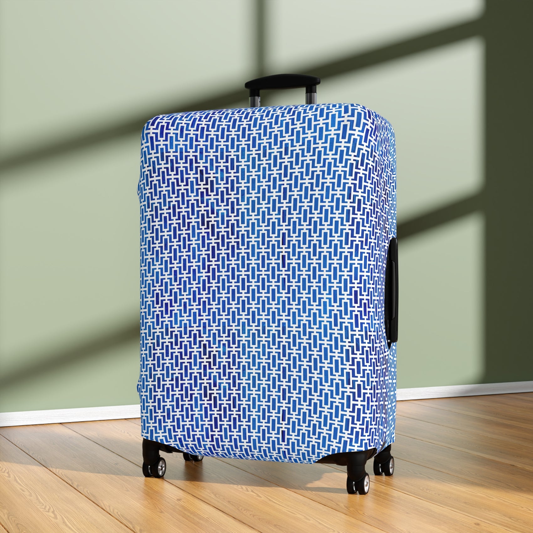 Aegean Passage blue Greek geometric stretch luggage cover with interlocking mosaic pattern