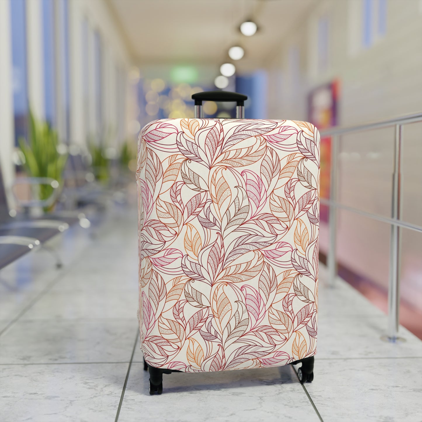 Andalusian Botanica terracotta botanical stretch luggage cover with flowing leaf pattern on rolling suitcase