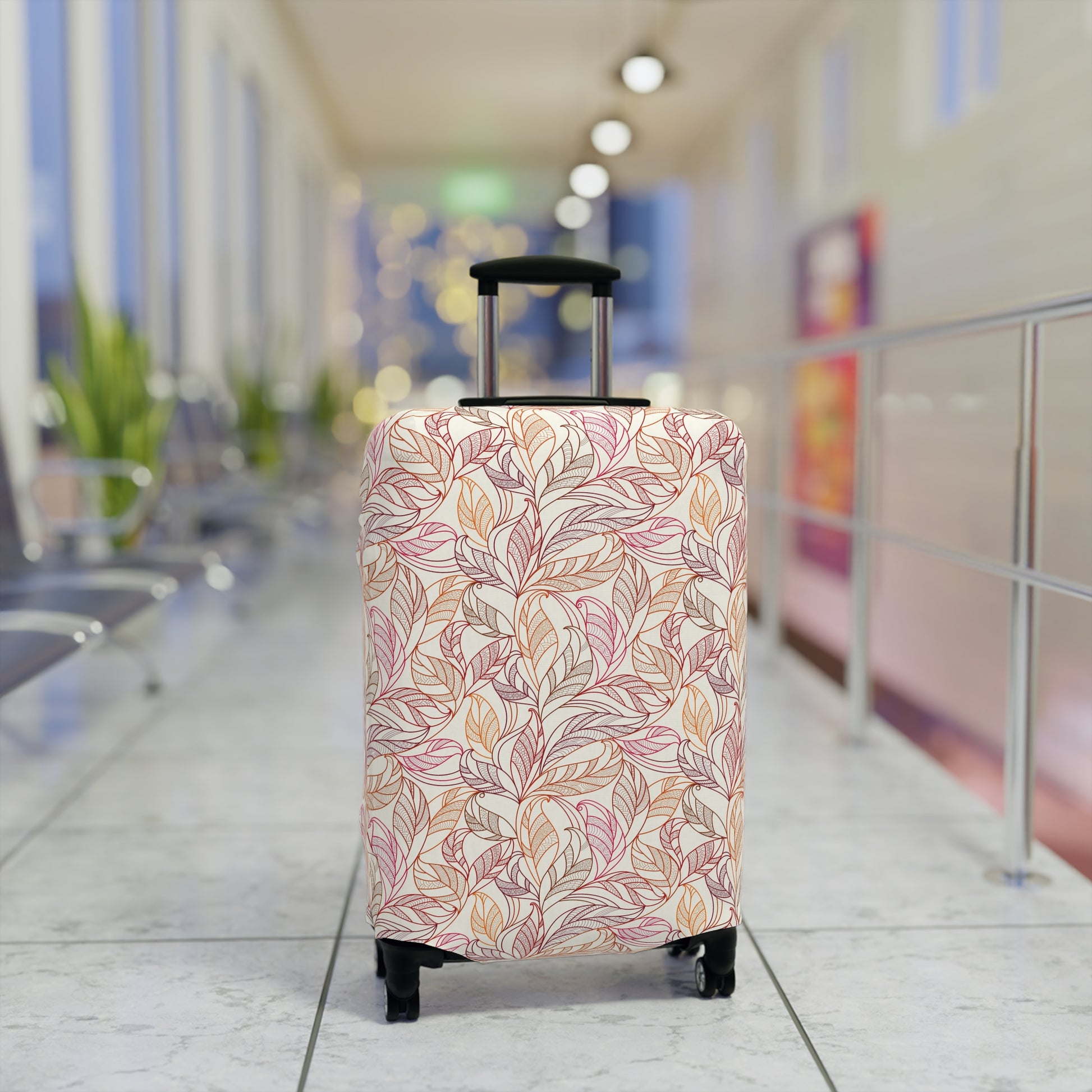 Andalusian Botanica terracotta botanical stretch luggage cover with flowing leaf pattern on rolling suitcase