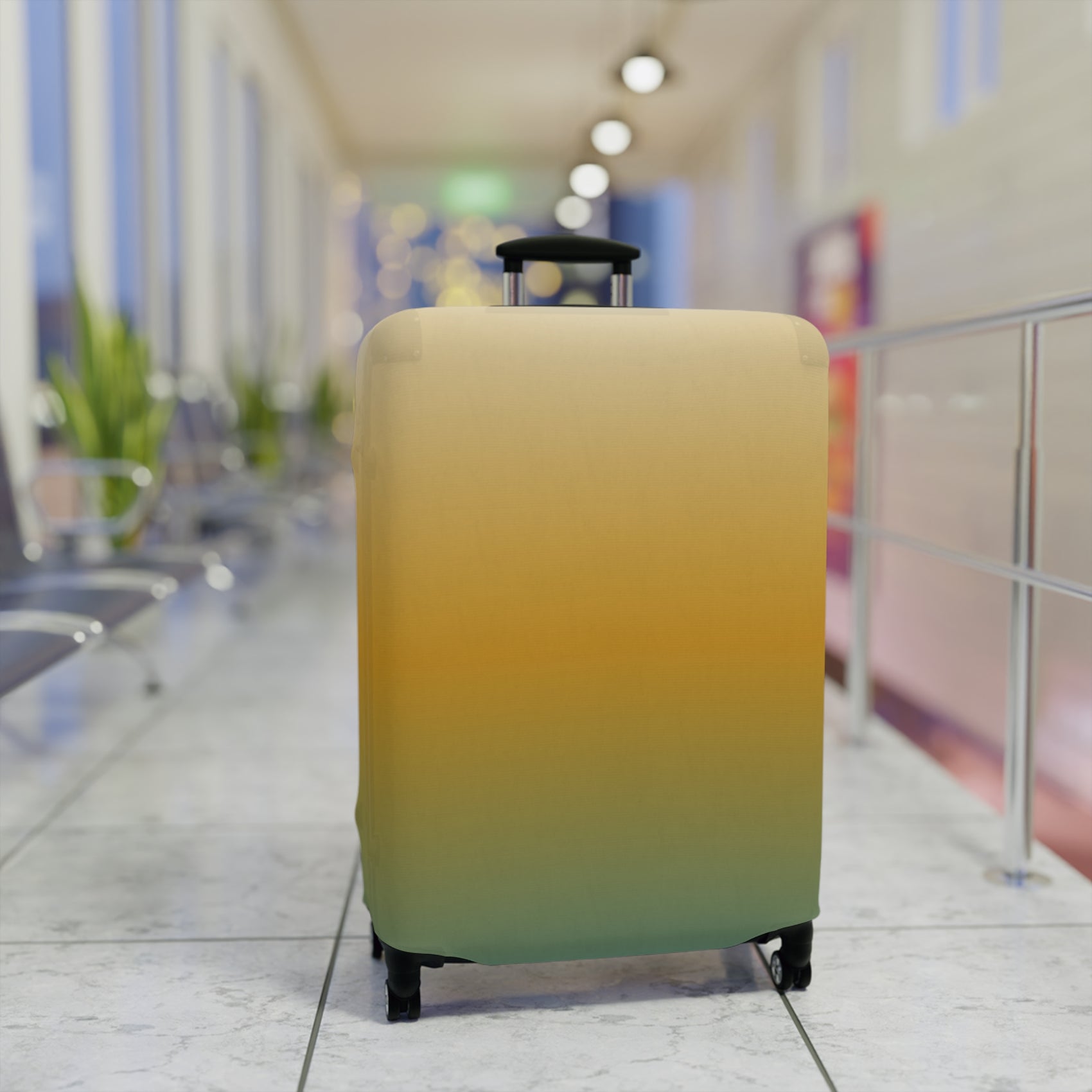 Baja Sunset gradient stretch luggage cover in golden amber and teal fitted on hard shell rolling suitcase