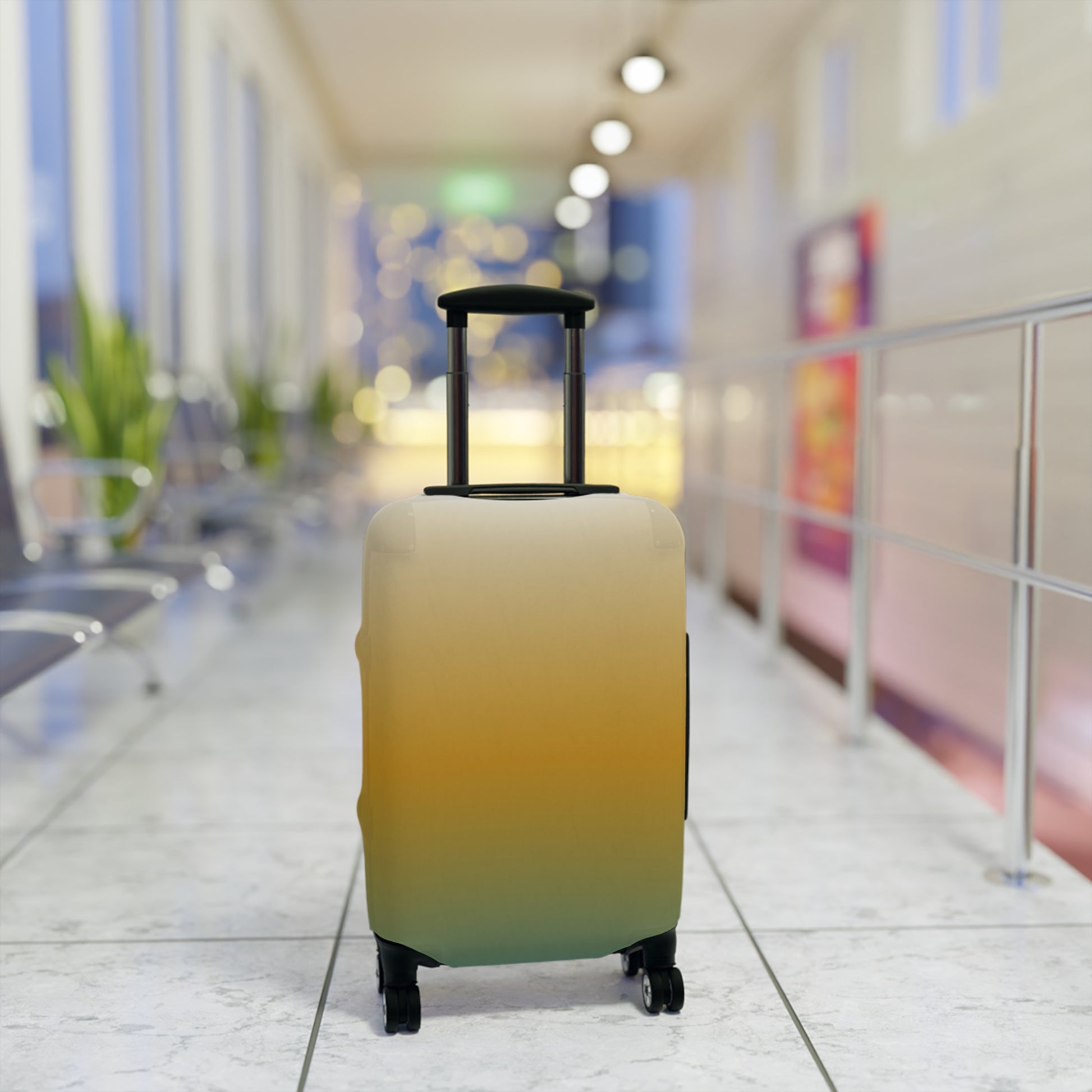 Baja Sunset gradient stretch luggage cover in golden amber and teal fitted on hard shell rolling suitcase