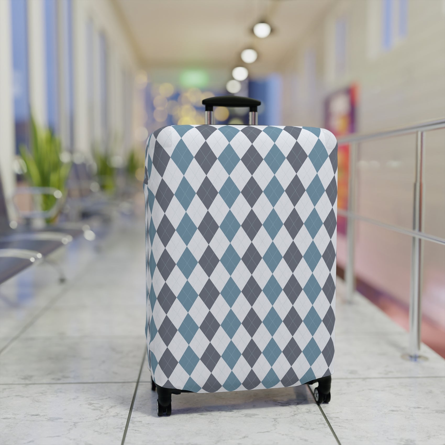 Caledonia Drift blue gray argyle stretch luggage cover with diamond pattern on rolling suitcase