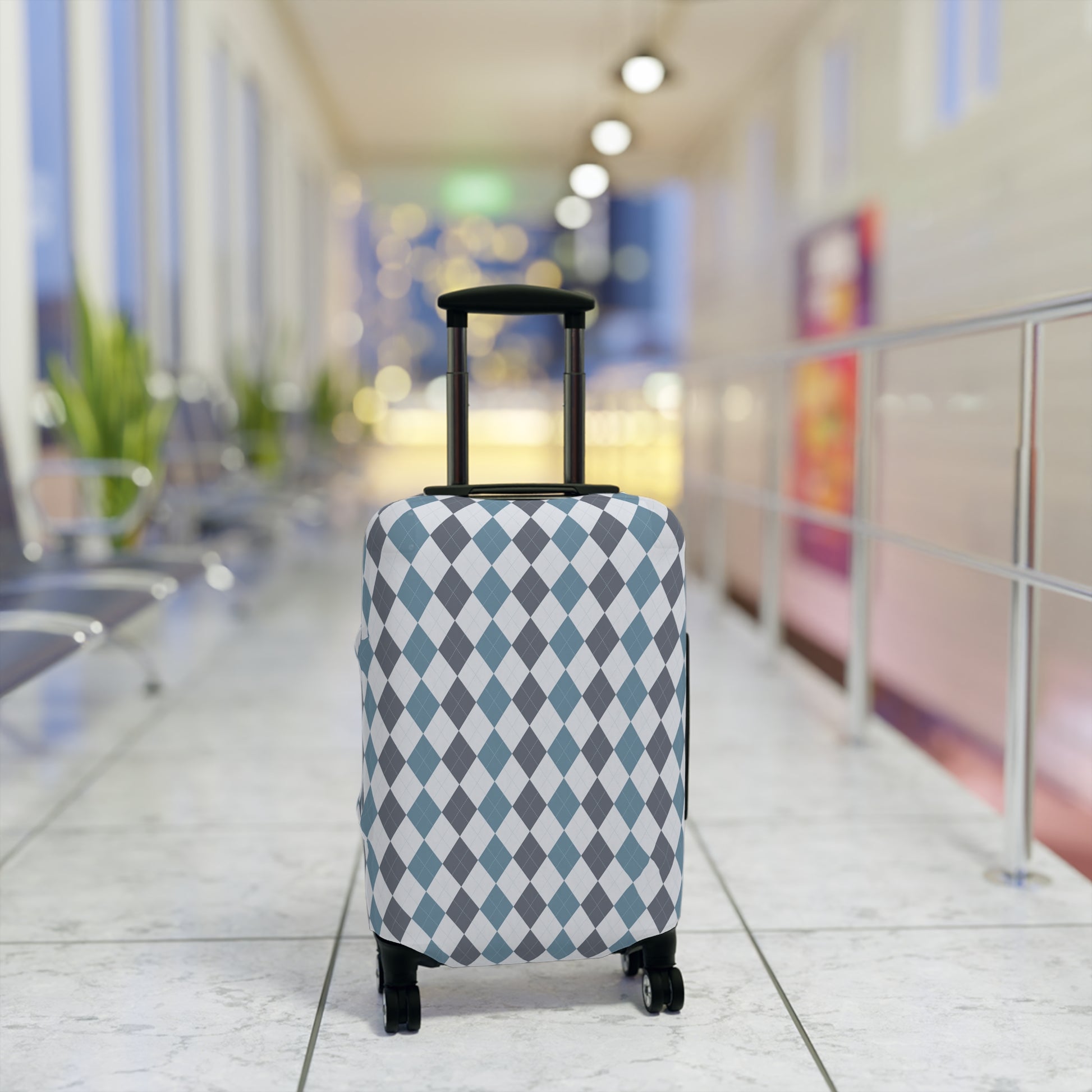 Caledonia Drift blue gray argyle stretch luggage cover with diamond pattern on rolling suitcase