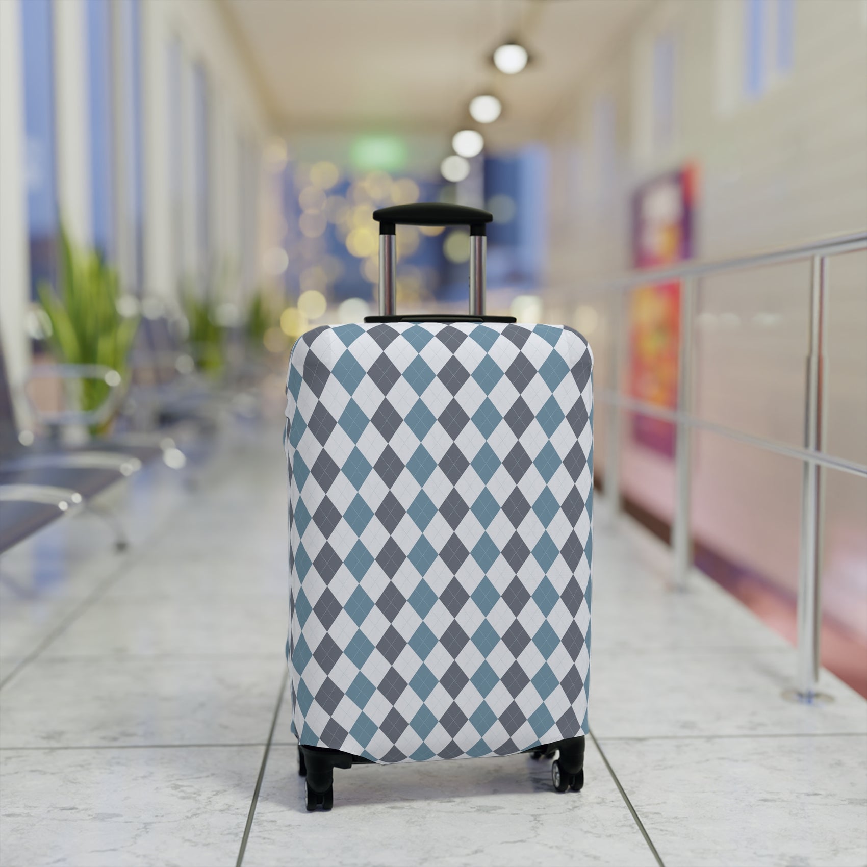 Caledonia Drift blue gray argyle stretch luggage cover with diamond pattern on rolling suitcase