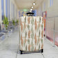 Cypress Guardians stretch luggage cover with Mediterranean tree silhouettes in earth tones