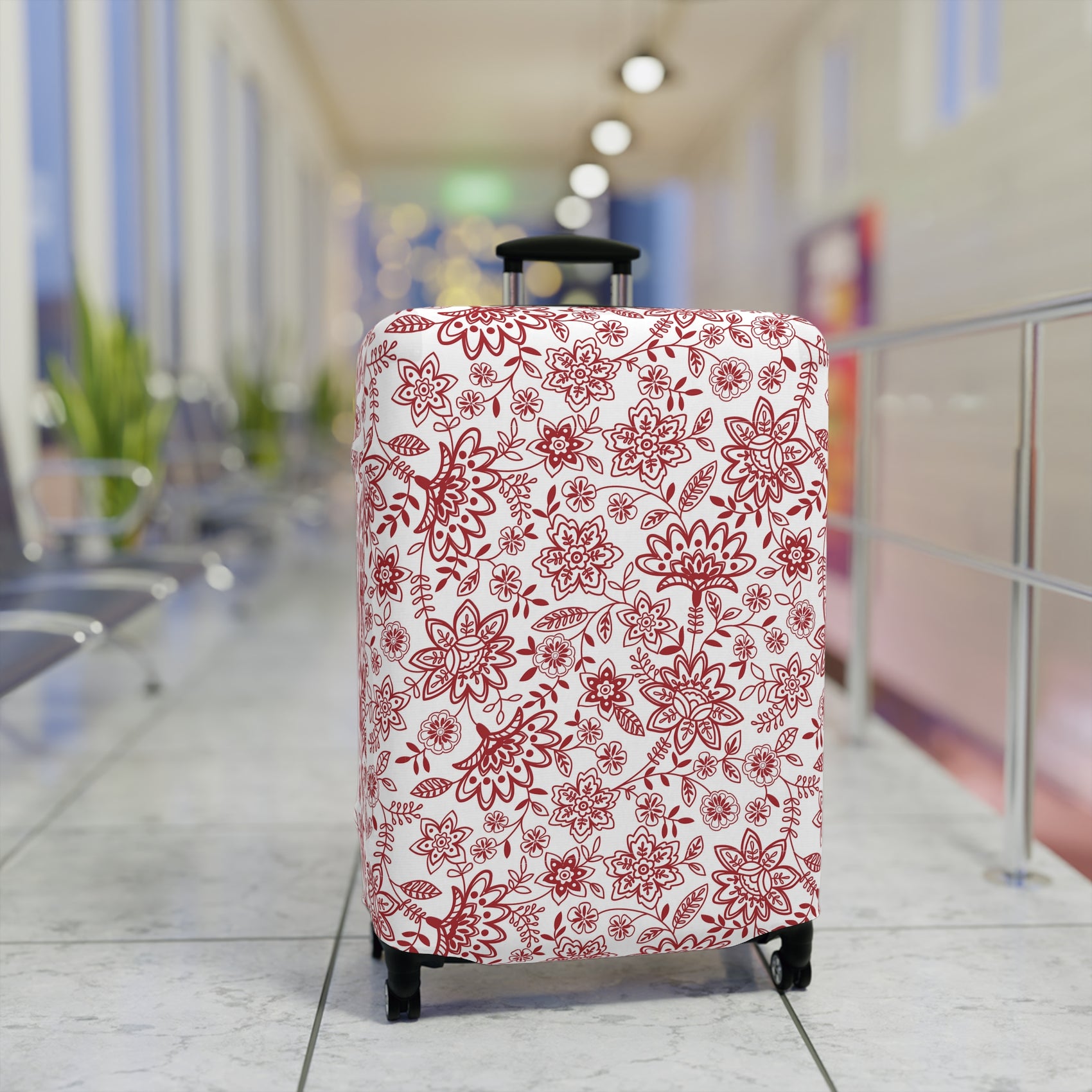 Folk Red stretch luggage cover with bold red floral pattern on white background