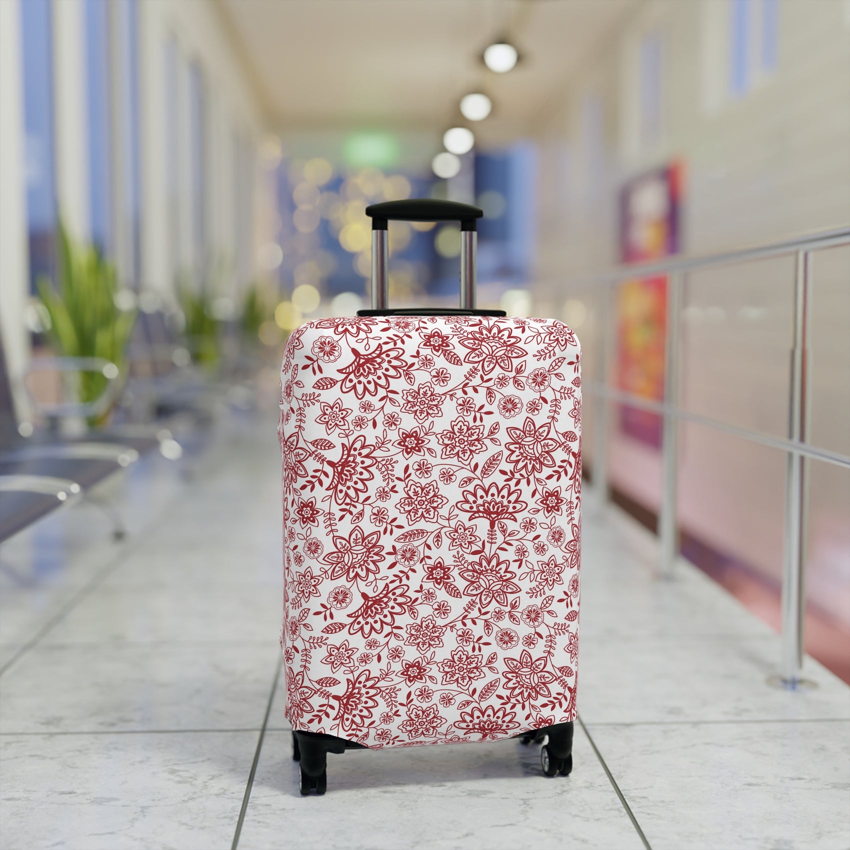 Folk Red stretch luggage cover with bold red floral pattern on white background