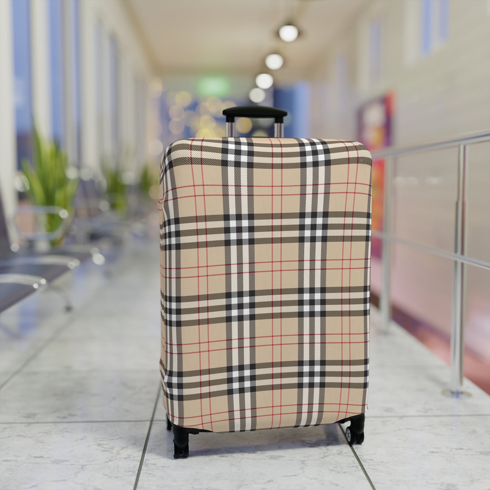 Kensington Road stretch luggage cover with classic beige check pattern and red accents