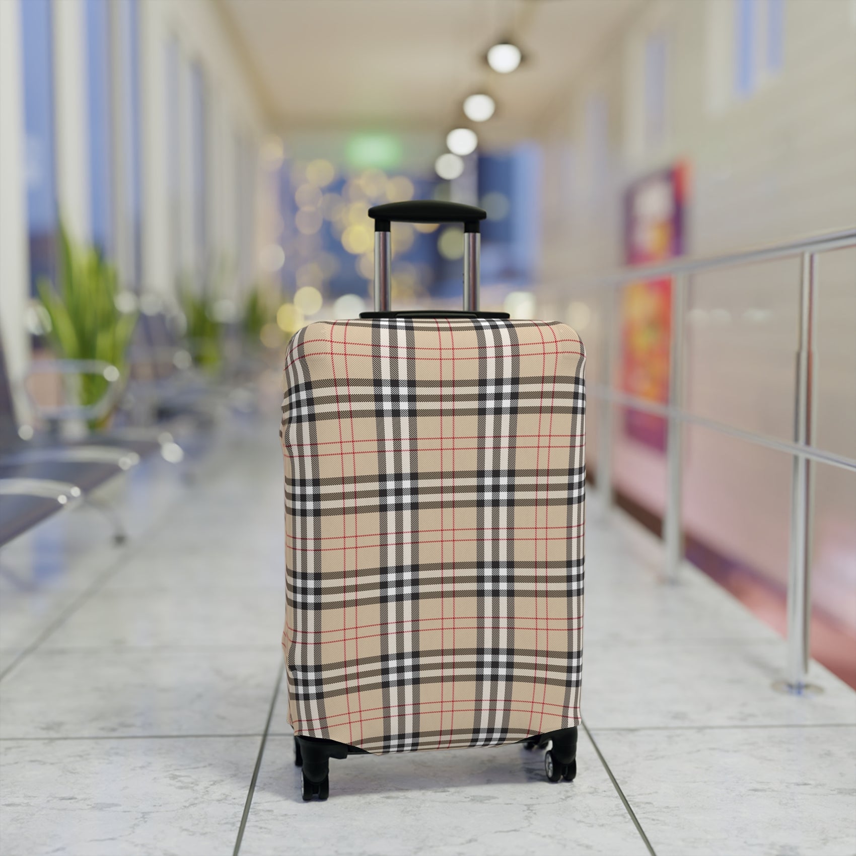 Kensington Road stretch luggage cover with classic beige check pattern and red accents