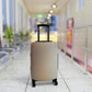 Moroccan Dune beige stretch luggage cover with sand-inspired gradient design fitted on suitcase