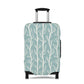 Norwegian Dusk tree pattern stretch luggage cover with white winter trees on blue green suitcase