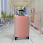 Rosé Afternoon pink stretch luggage cover with blush gradient design fitted on rolling suitcase