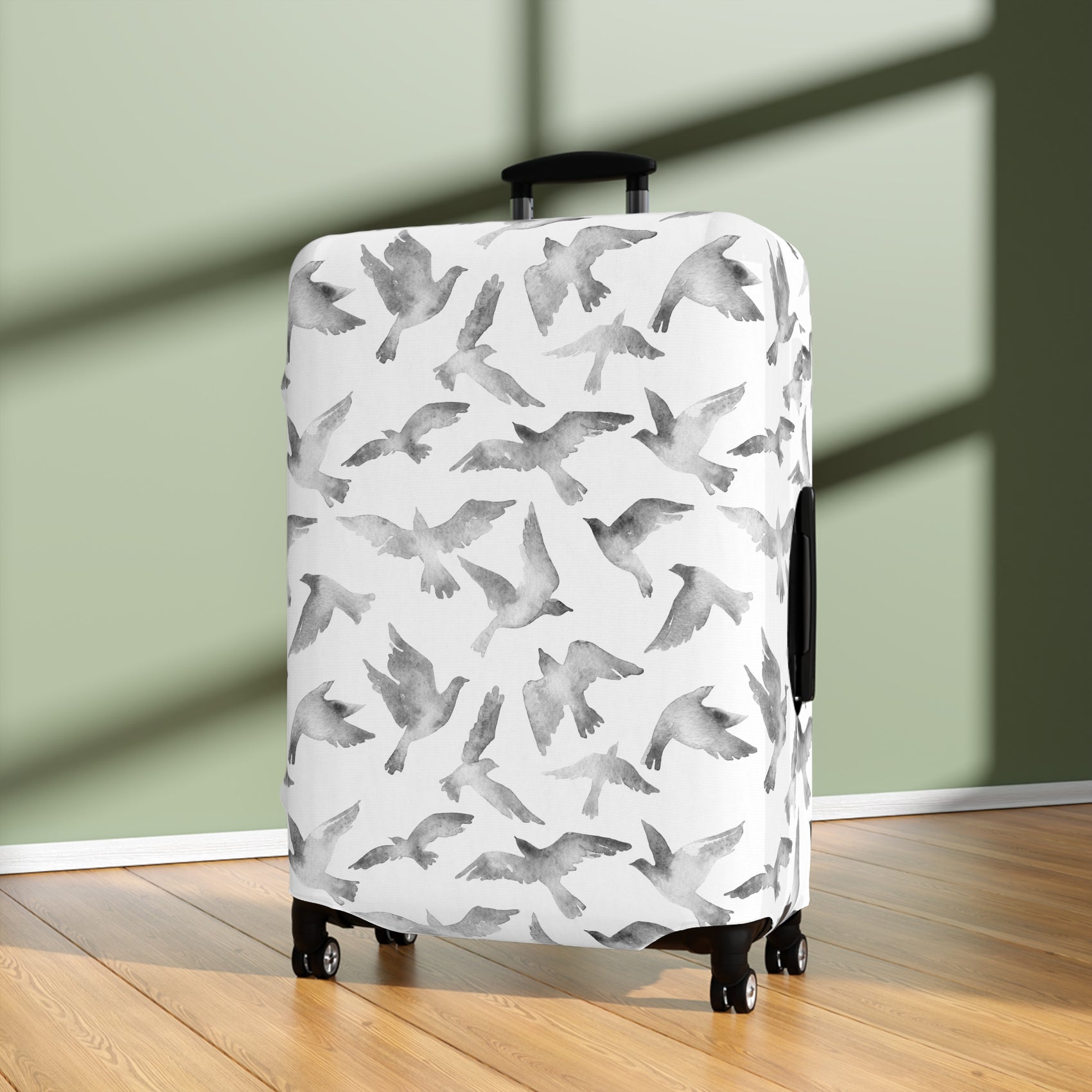 Streets to Sky stretch luggage cover with abstract gray bird silhouettes on white background