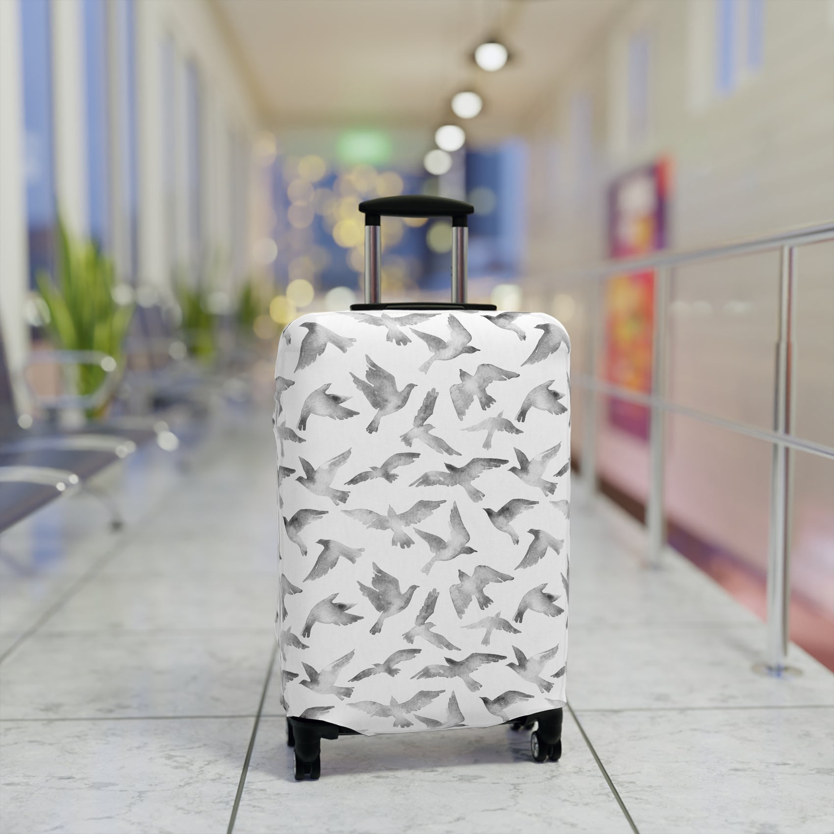 Streets to Sky stretch luggage cover with abstract gray bird silhouettes on white background