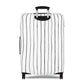 Black and white striped stretch luggage cover with zipper closure protecting a rolling suitcase