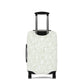 Urban Botanica stretch luggage cover with minimalist green leaf pattern on white background