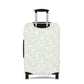 Urban Botanica stretch luggage cover with minimalist green leaf pattern on white background
