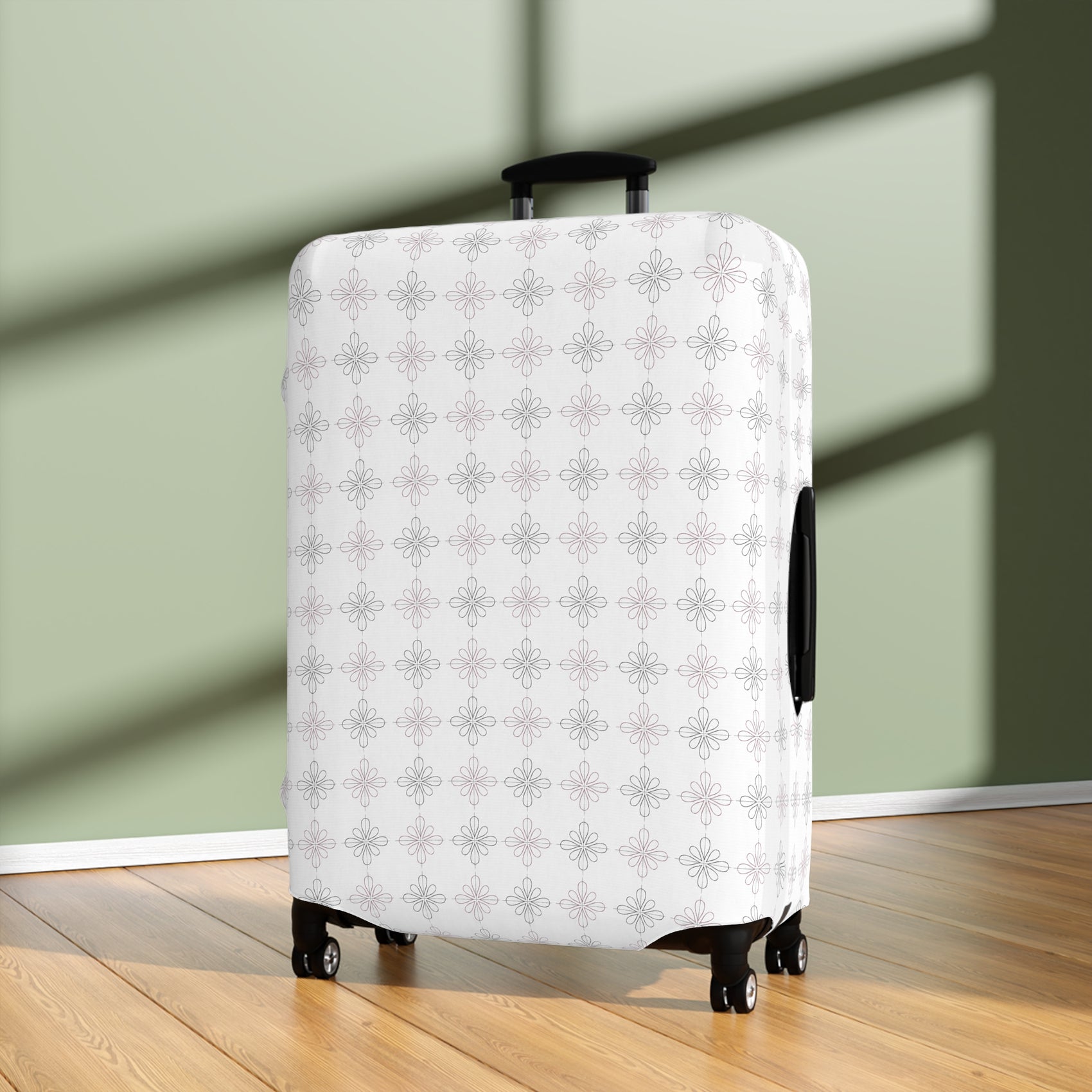 White floral minimalist stretch luggage cover protecting a rolling suitcase