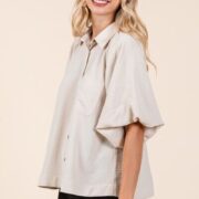 Airflow Short Bubble Sleeve Button-Down Shirt, featuring lightweight fabric and chic sleeves Stylish button-down blouse, perfect for work, travel, or casual outings Breathable and slightly stretchy short sleeve top, designed for comfort Classic button-down shirt with feminine bubble sleeves, versatile and elegant Effortlessly chic and lightweight women’s blouse, ideal for warm weather