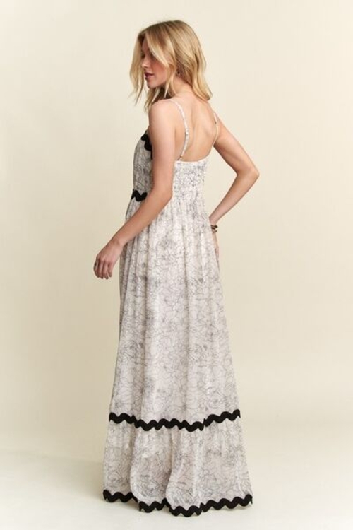 Floral Adjustable Strap Maxi Dress, featuring a romantic floral print and flowy silhouette Lightweight and breathable maxi dress, perfect for summer outings Elegant adjustable strap dress, ideal for vacations and garden parties Chic floral maxi dress with lined interior, stylish and comfortable Versatile floral maxi dress, easy to dress up or down for any occasion