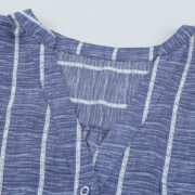 Blue Striped V-Neck Blouse - Front View Elegant Button-Down Blouse for Work & Travel Wear Soft & Lightweight Striped Long Sleeve Shirt for Jet Setters Business Casual Blouse Styled with Trousers for Travel Days Classic Striped Shirt with Pockets & Button Details - Perfect for Exploring
