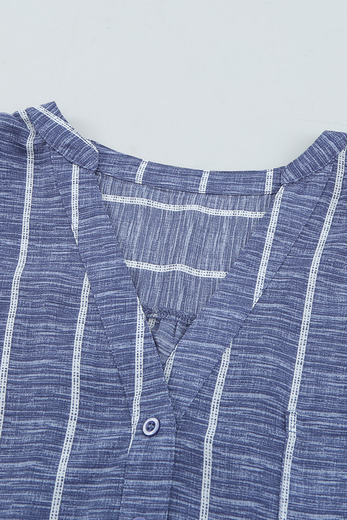 Blue Striped V-Neck Blouse - Front View Elegant Button-Down Blouse for Work & Travel Wear Soft & Lightweight Striped Long Sleeve Shirt for Jet Setters Business Casual Blouse Styled with Trousers for Travel Days Classic Striped Shirt with Pockets & Button Details - Perfect for Exploring