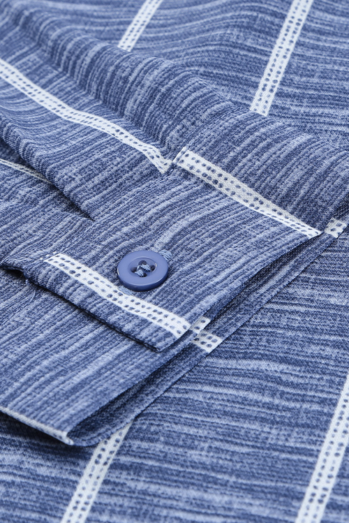 Blue Striped V-Neck Blouse - Front View Elegant Button-Down Blouse for Work & Travel Wear Soft & Lightweight Striped Long Sleeve Shirt for Jet Setters Business Casual Blouse Styled with Trousers for Travel Days Classic Striped Shirt with Pockets & Button Details - Perfect for Exploring