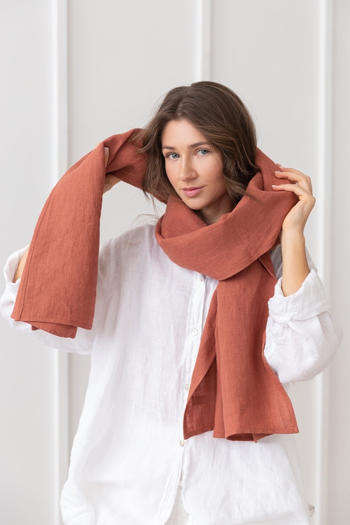 Reddish Brown Stonewashed Linen Scarf with Hemmed Edge Soft Linen Scarf with Tassels in Warm Reddish Brown Lightweight Breathable Linen Scarf Draped Over Shoulder Elegant Unisex Linen Scarf Styled for All Seasons Close-up of Stonewashed Linen Texture in Natural Light
