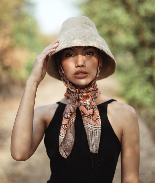 Hand-Dyed Cotton Scarf Naturally Dyed with Avocado and Madder Eco-Friendly Lightweight Cotton Scarf Draped Over Shoulders Soft Cotton Scarf in Earthy Tones with Natural Dye Variations Ethically Made Handwoven Scarf Styled as a Headwrap USA-Made Sustainable Fashion Scarf in Soft Cotton