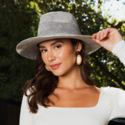 Wide Brim Pinched Front Hat in natural color Boho Travel Hat - Side View in Grey Close-up of Pinch Crown Detail Stylish Wide Brim Hat for Sun Protection Adventure Travel Hat in Natural Color