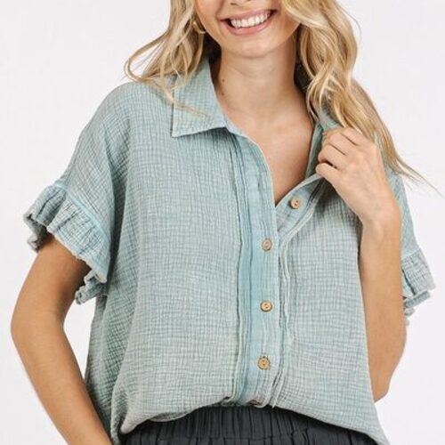 Softly Faded Blue Button-Down Shirt with a vintage-wash finish and relaxed fit Breathable cotton button-down for casual and dressy occasions Feminine flounce sleeve shirt, perfect for effortless, stylish outfits Lightweight long sleeve shirt, ideal for layering or wearing solo Timeless mineral-washed button-down, designed for comfort and style